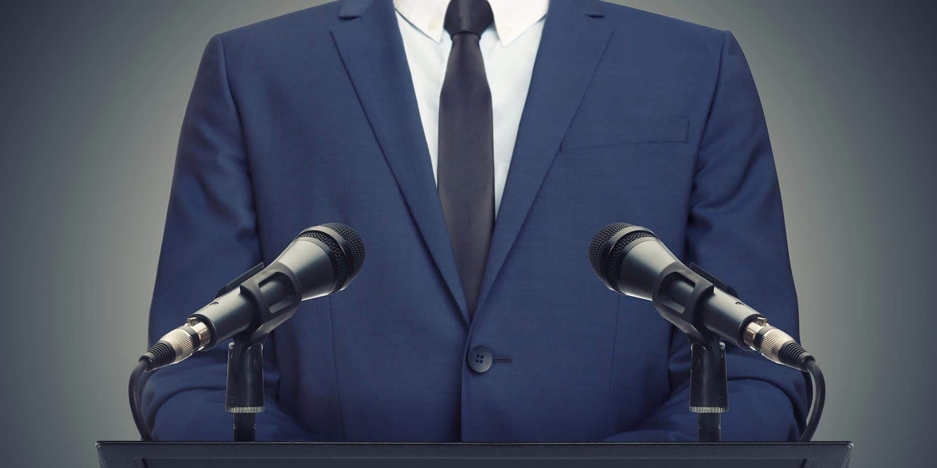 Campaignz original hero — candidate at the microphones